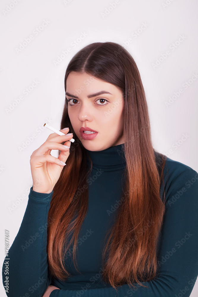 Quit Bad Habit. Beautiful Happy Woman Holding Cigarette Quit Bad Habit. Beautiful Happy Woman Holding Cigarette