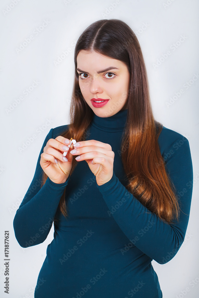 Woman Hand Showing Broken Cigarette. Unhealthy Lifestyle Woman Hand Showing Broken Cigarette. Unhealthy Lifestyle