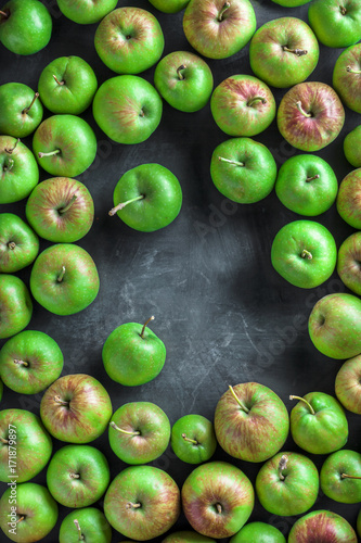 Wallpaper Mural Green and red large colorful group of organic apples overhead on rustic black board in studio Torontodigital.ca