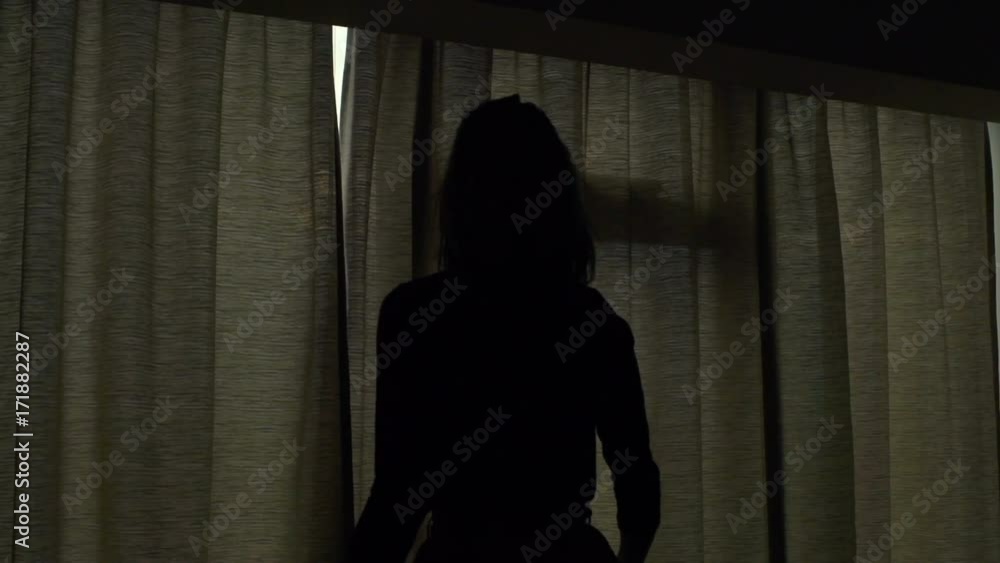 Woman unveil curtain and admire view from window at home, super slow motion 240fps
Woman unveil curtain and admire view from window at home, super slow motion 240fps