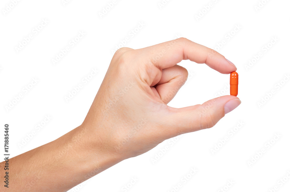 Capsules pills in hand isolated on white background Capsules pills in hand isolated on white background