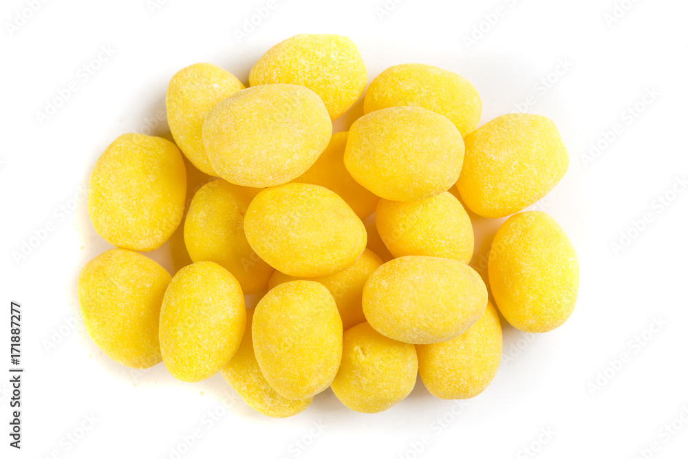 Pile of lemon candies isolated on a white background Pile of lemon candies isolated on a white background