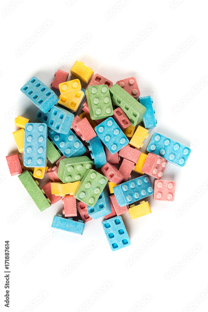 Pile of multicolored candy building blocks isolated on a white background Pile of multicolored candy building blocks isolated on a white background