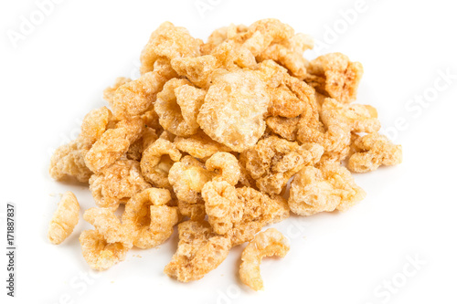 Pile of pork rinds isolated on a white background