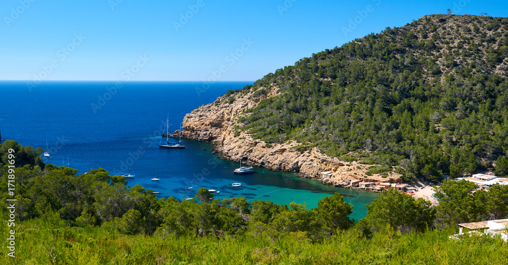 Rocky coastline of Benirras in Ibiza Island. Spain
