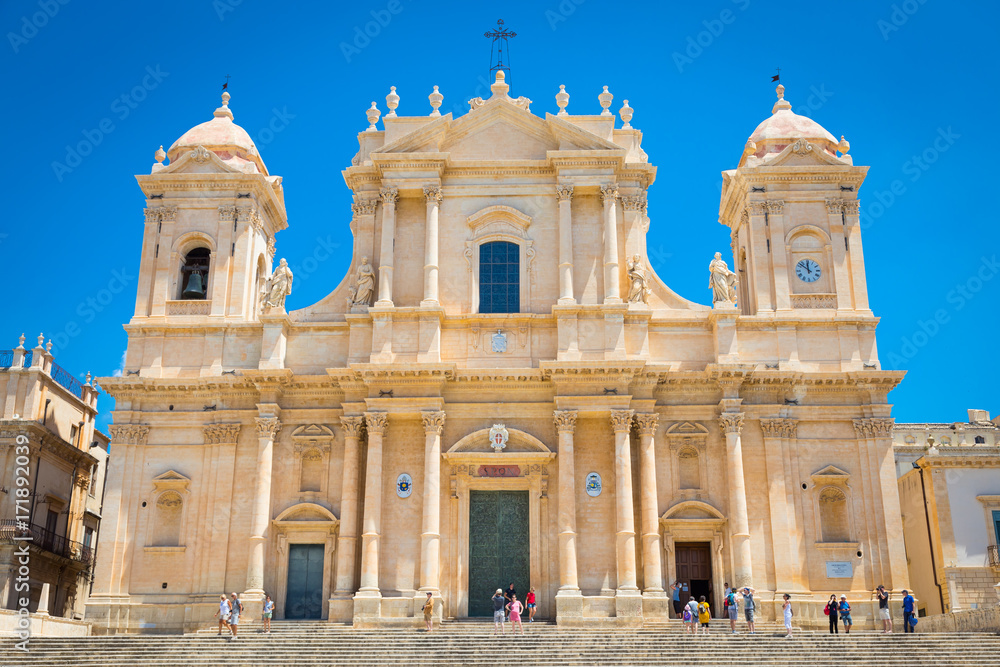 NOTO, ITALY - 21th June 2017: tourists in front of San Nicolò Cathedral, UNESCO Heritage Site