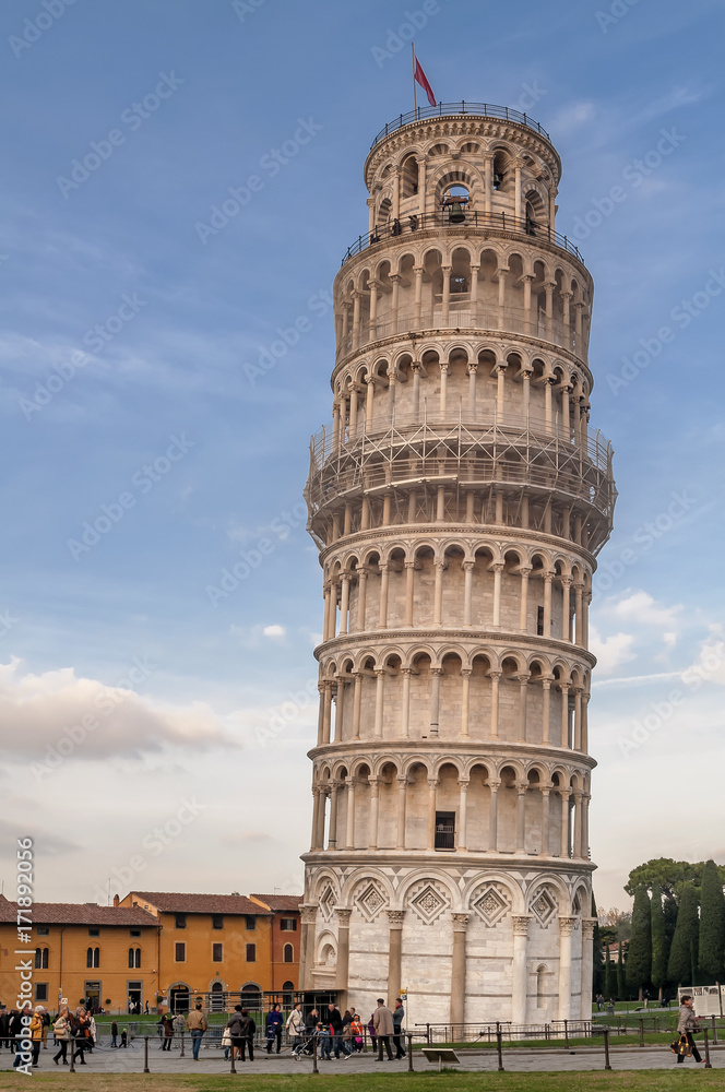 Beautiful view of the famous Tower of Pisa, Tuscany, Italy, on a day with blue sky