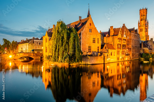 Bruges (Brugge) cityscape with water canal at night
