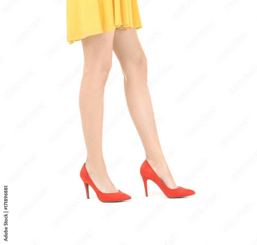 Young woman wearing dress and high heels on white background Young woman wearing dress and high heels on white background