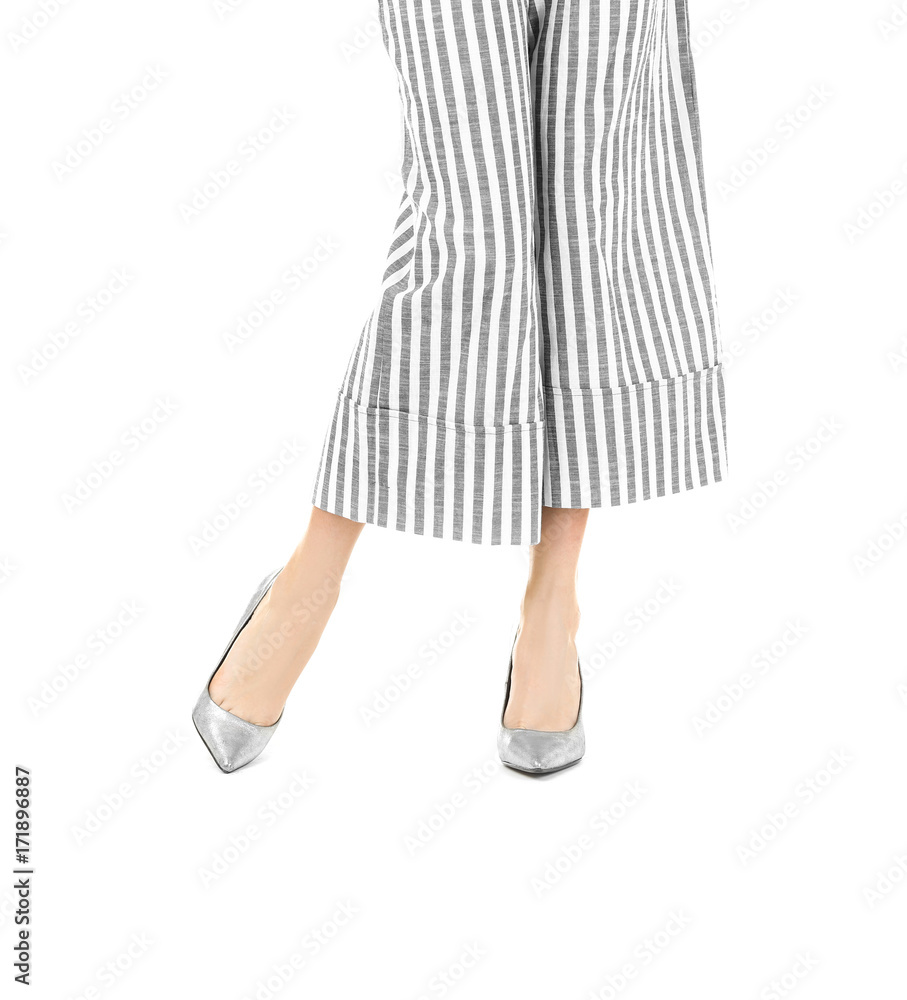 Young woman in high heels on white background Young woman in high heels on white background