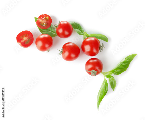 Fototapeta Naklejka Na Ścianę i Meble -  Cherry tomatoes and green fresh organic basil isolated on white