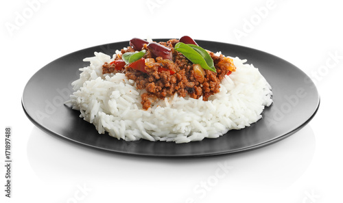 Chili con carne served with rice on plate against white background