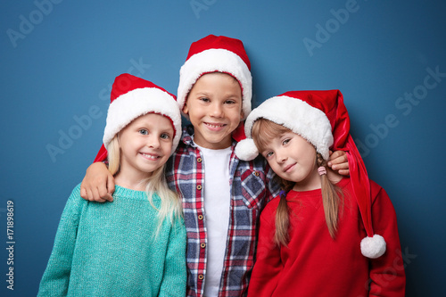 Cute children in Santa hats...