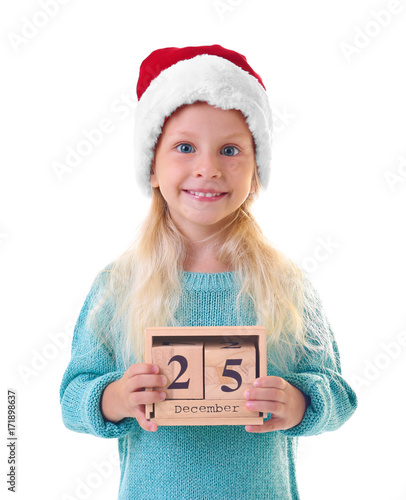 Cute girl in Santa hat with...