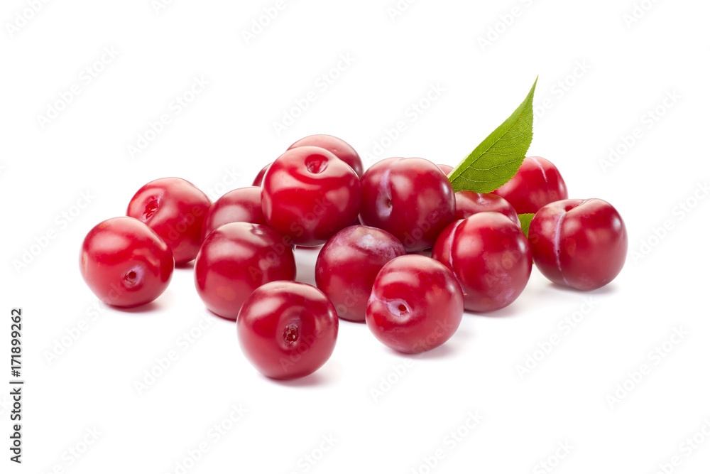 Heap of ripe red plums on white Heap of ripe red plums on white