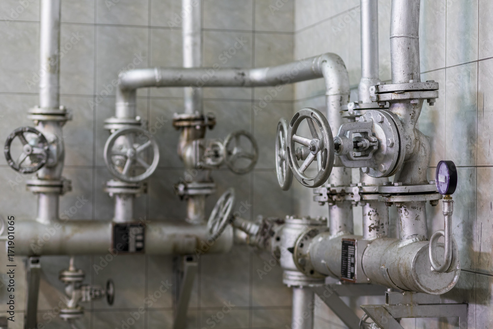 Handle valve with steel pipe in industrial plant. Handle valve with steel pipe in industrial plant.