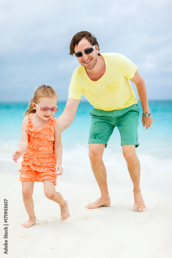 Father and daughter at beach