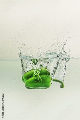 Bell pepper falls in water