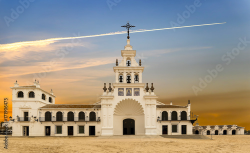 El Rocio hermitage in a cloudy day at small village with the same name in Almonte, Huelva, Andalusia, Spain photo