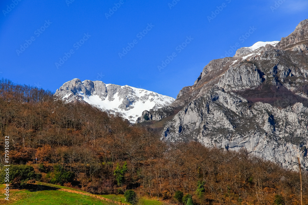 Winter Landscape in Picos de Europa mountains, Cantabria, Spain. The jagged, deeply fissured Picos de Europa mountains straddle southeast Asturias, southwest Cantabria and northern Castilla y Leon.