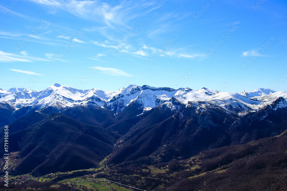 Winter Landscape in Picos de Europa mountains, Cantabria, Spain. The jagged, deeply fissured Picos de Europa mountains straddle southeast Asturias, southwest Cantabria and northern Castilla y Leon. Winter Landscape in Picos de Europa mountains, Cantabria, Spain. The jagged, deeply fissured Picos de Europa mountains straddle southeast Asturias, southwest Cantabria and northern Castilla y Leon.