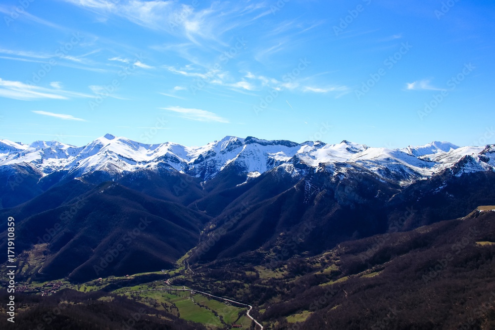 Winter Landscape in Picos de Europa mountains, Cantabria, Spain. The jagged, deeply fissured Picos de Europa mountains straddle southeast Asturias, southwest Cantabria and northern Castilla y Leon.