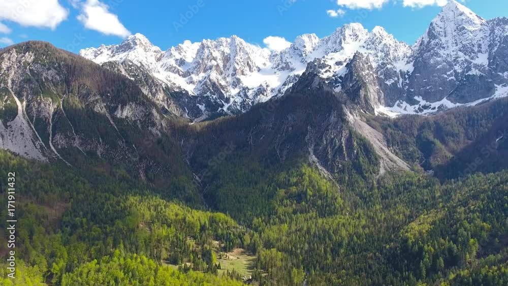 Aerial view on mountains in Triglav national park in Slovenia at spring, 4k
Aerial view on mountains in Triglav national park in Slovenia at spring, 4k