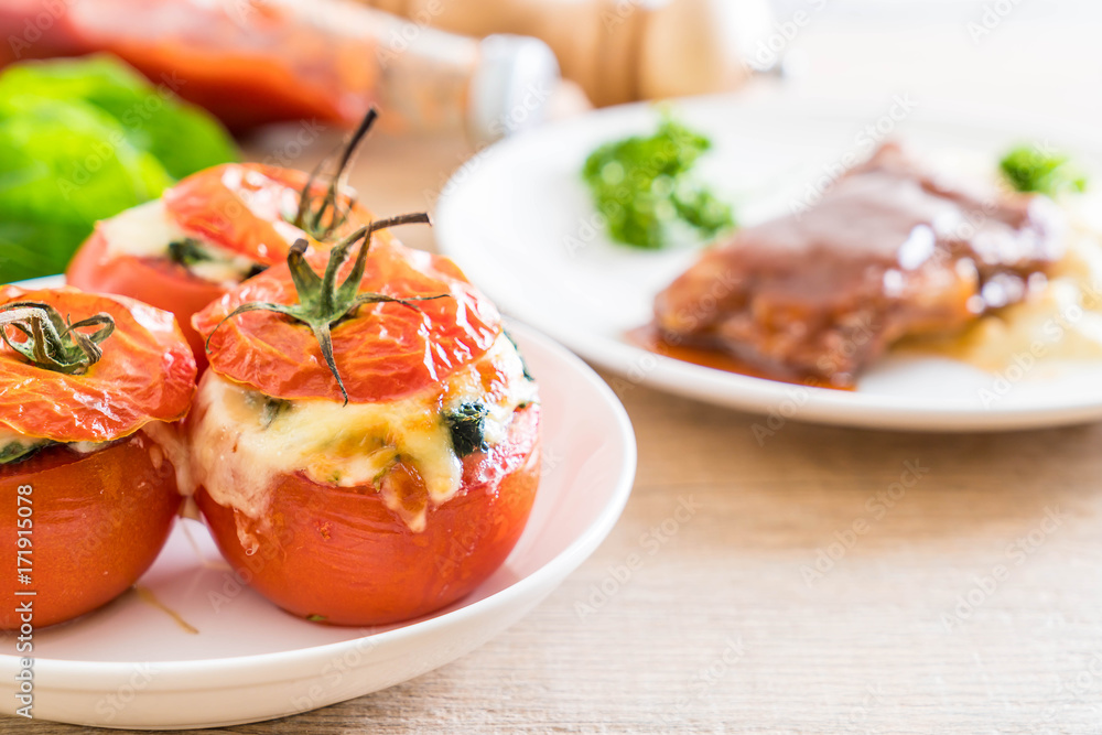  baked tomatoes stuffed with cheese and spinach