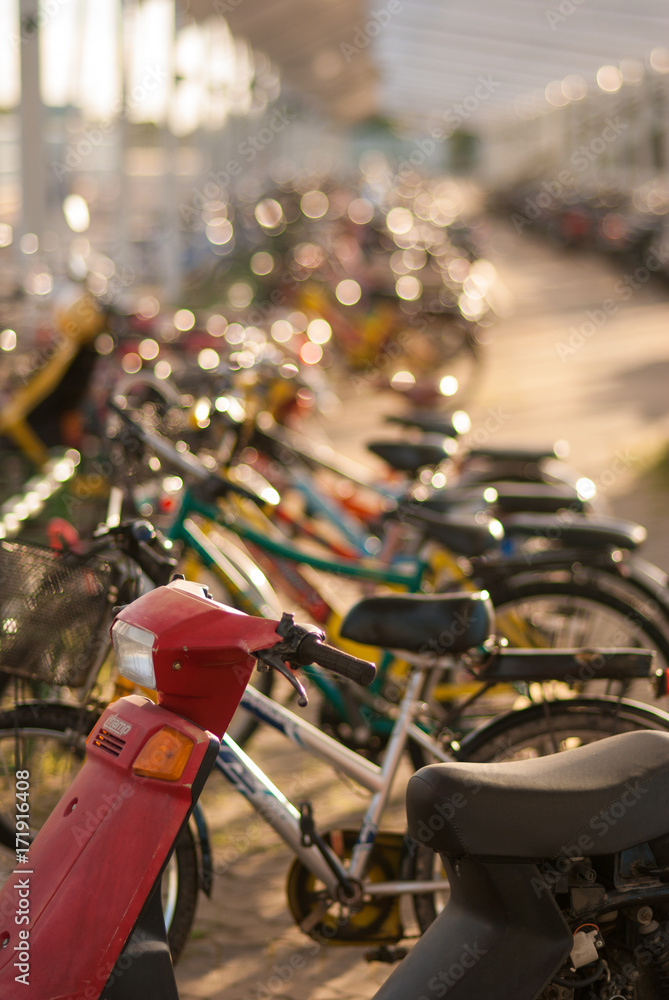 Motorbike and bicycles parking besides university Motorbike and bicycles parking besides university