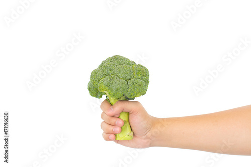 Green fresh broccoli in hands on white background