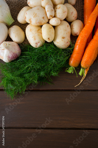 fresh vegetables on wooden surface