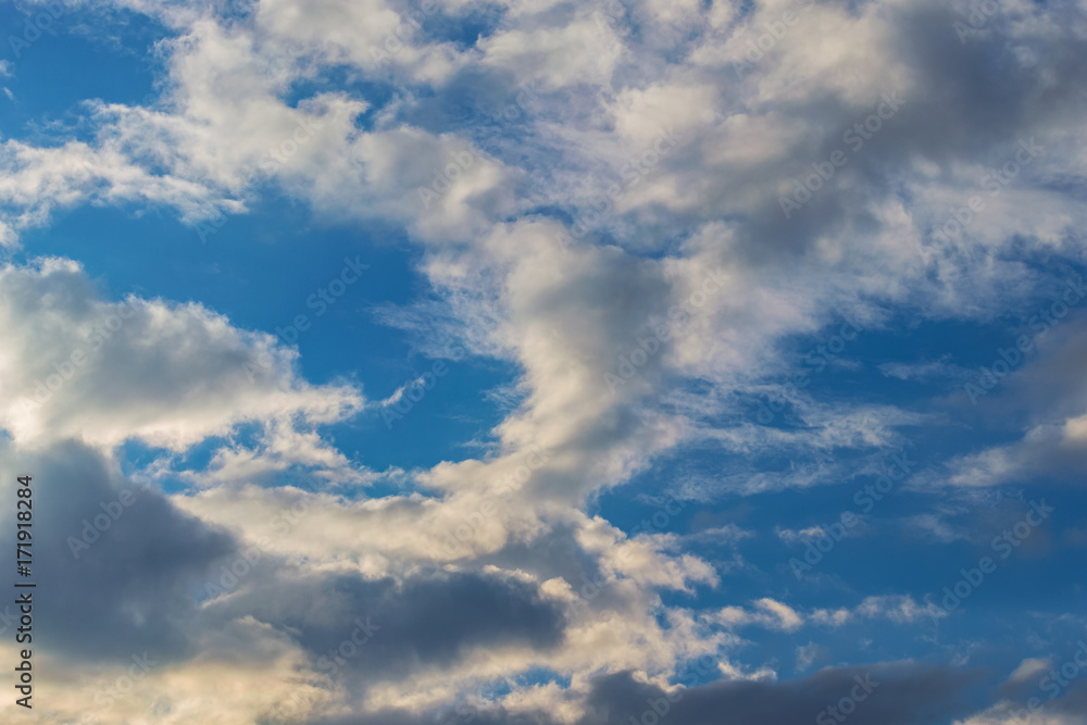 background of a blue sky with a white clouds