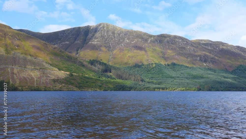 View of the lake at the foot of the mountains. View of the lake at the foot of the mountains.