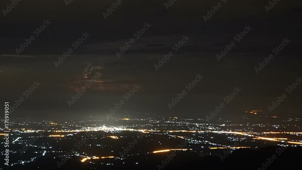 The motion of Lightning over the countryside at night. Timelapse at Phu Tubberk , Phetchabun ,Thailand The motion of Lightning over the countryside at night. Timelapse at Phu Tubberk , Phetchabun ,Thailand