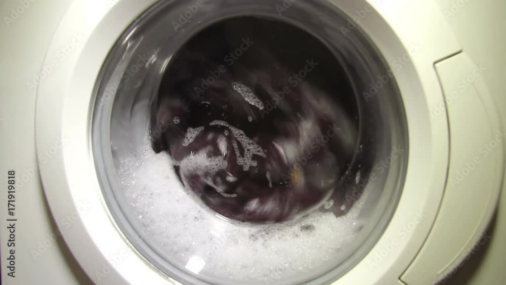 washing machine. glass drum rotates. washing machine. glass drum rotates.