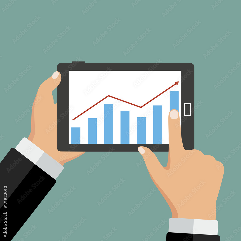 computer in hand with business chart computer in hand with business chart