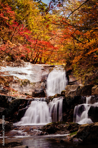 Gangwon-do Province, South Korea - Red leaves and Bangtaesan two-stage waterfall.