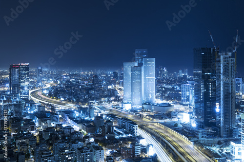 Tel Aviv Skyline At Night  Skyscraper and Ayalon Freeway - Toned In Blue