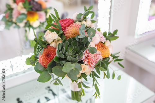 Fototapeta Naklejka Na Ścianę i Meble -  bright wedding bouquet of summer dahlias and roses