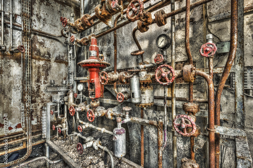 Derelict industrial boiler room in a disused factory