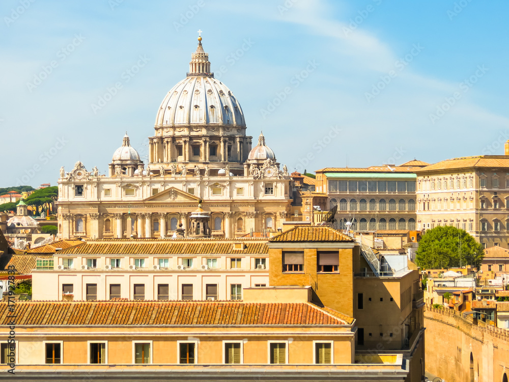 View of the St Peter's Basilica in Vatican City and roofs of Rome, Italy