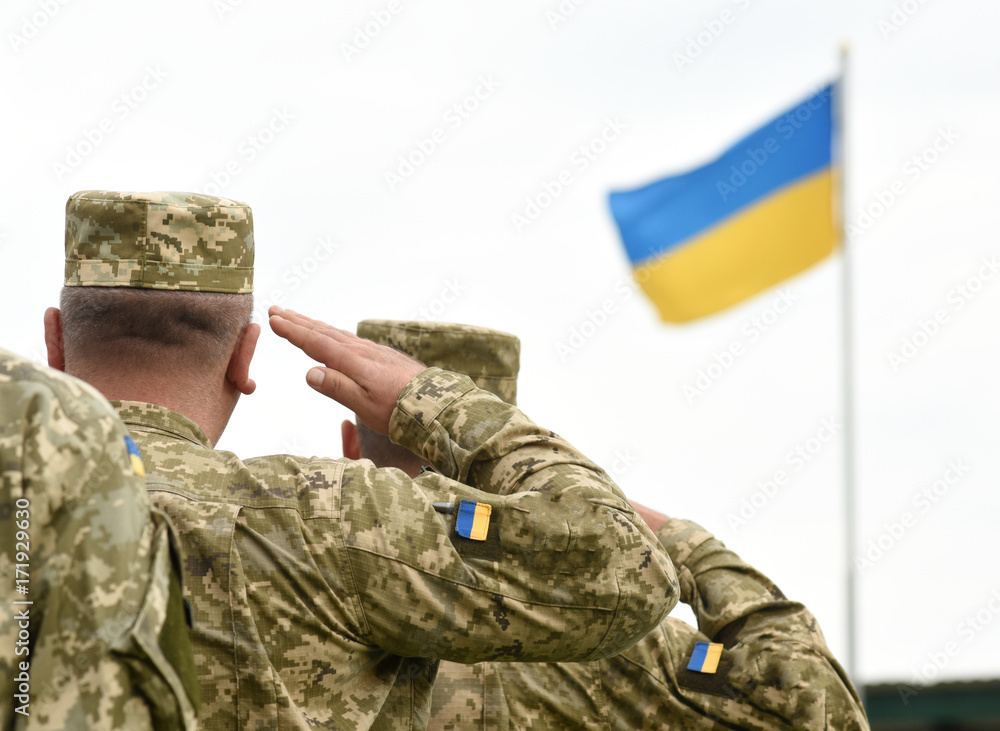 Ukrainian soldiers giving salute. Flag of Ukraine Stock Photo | Adobe Stock