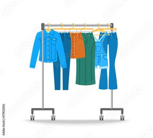 Women jean clothes hanging on hanger rack with rolling wheels. Vector flat illustration. New cotton collection. Trendy season wear. Jeans, jacket, skirts and jumpsuit shorts for stylish girl wardrobe.