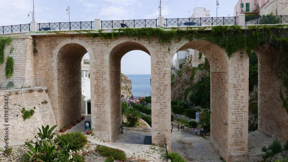 Beautiful old bridge in Polignano a Mare, Puglia region, Italy Beautiful old bridge in Polignano a Mare, Puglia region, Italy