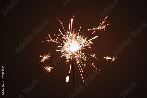 Sparkler firework light glowing in the dark  for celebration and birthday 
