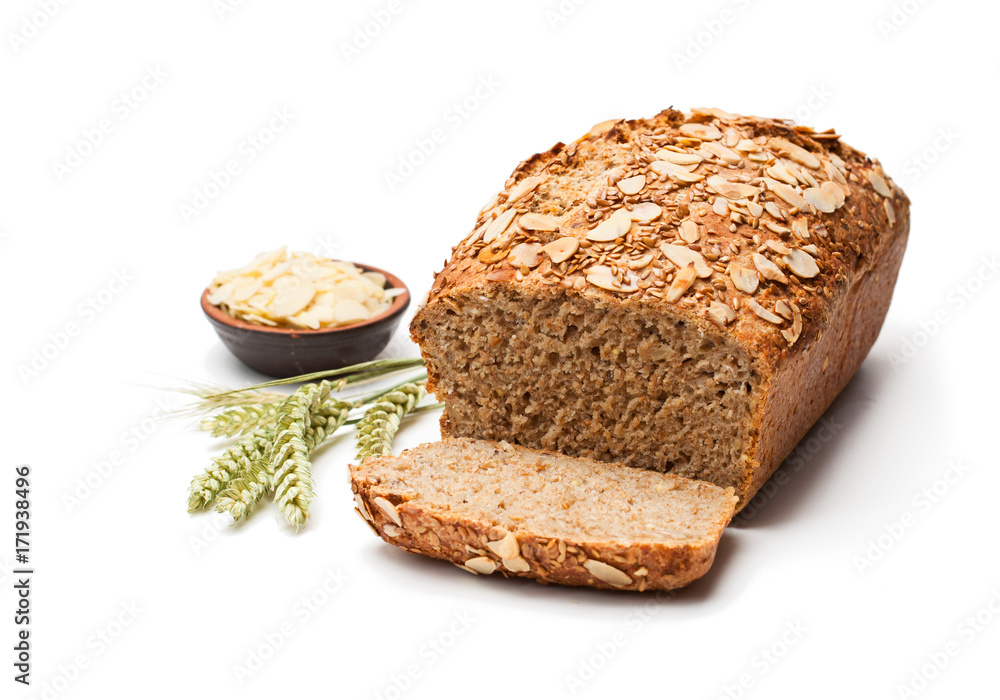 Homemade wholemeal rye bread with almonds isolated on white Homemade wholemeal rye bread with almonds isolated on white