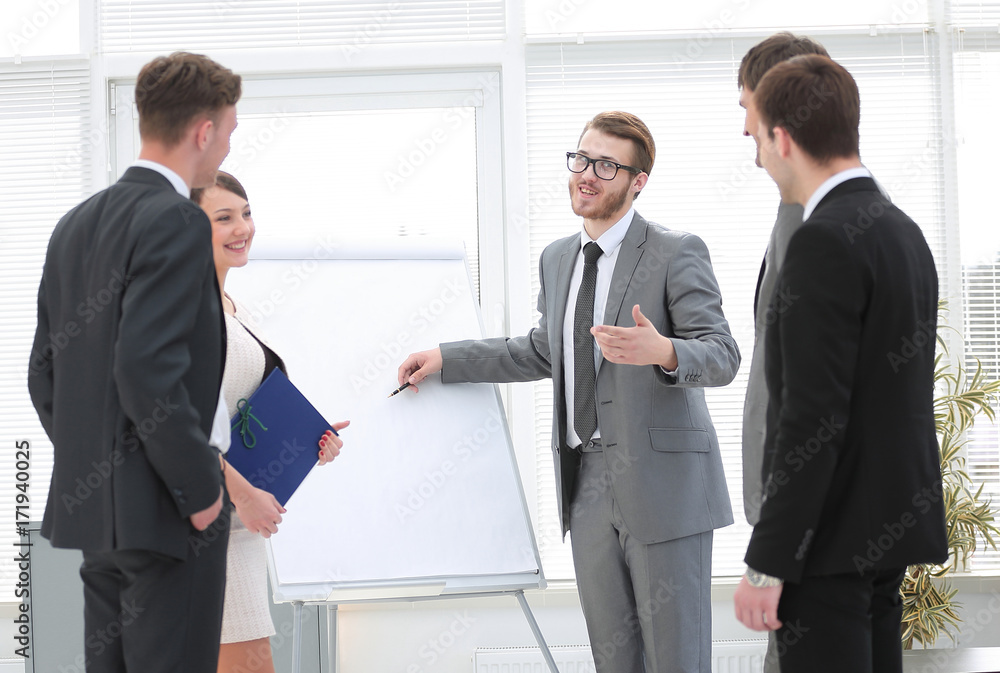 group of employees to discuss ideas during the presentation of the new project group of employees to discuss ideas during the presentation of the new project