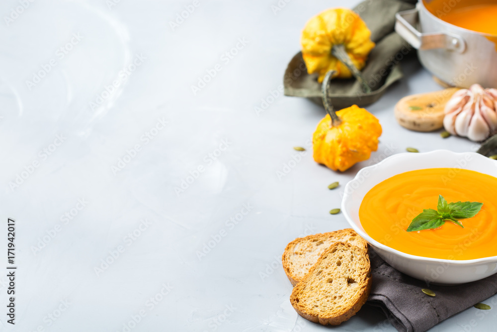 Fall autumn roasted orange pumpkin carrot soup with garlic Fall autumn roasted orange pumpkin carrot soup with garlic