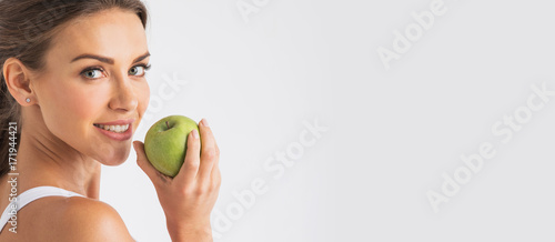 Perfect woman with apple