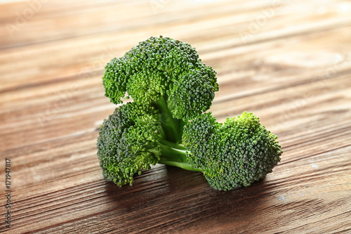 Fresh broccoli on wooden table